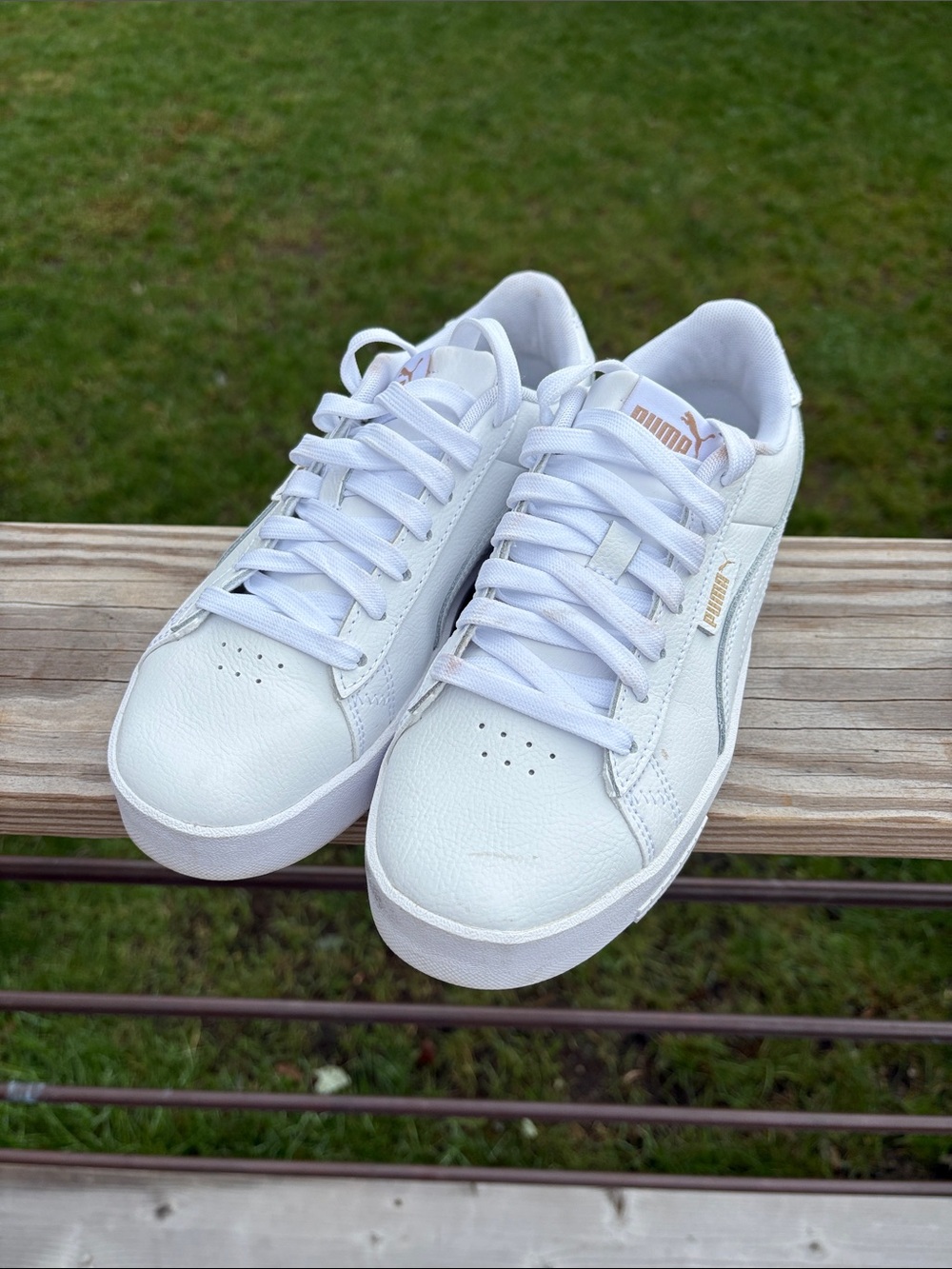 Puma Women's White Sneakers with Subtle Gold Logo